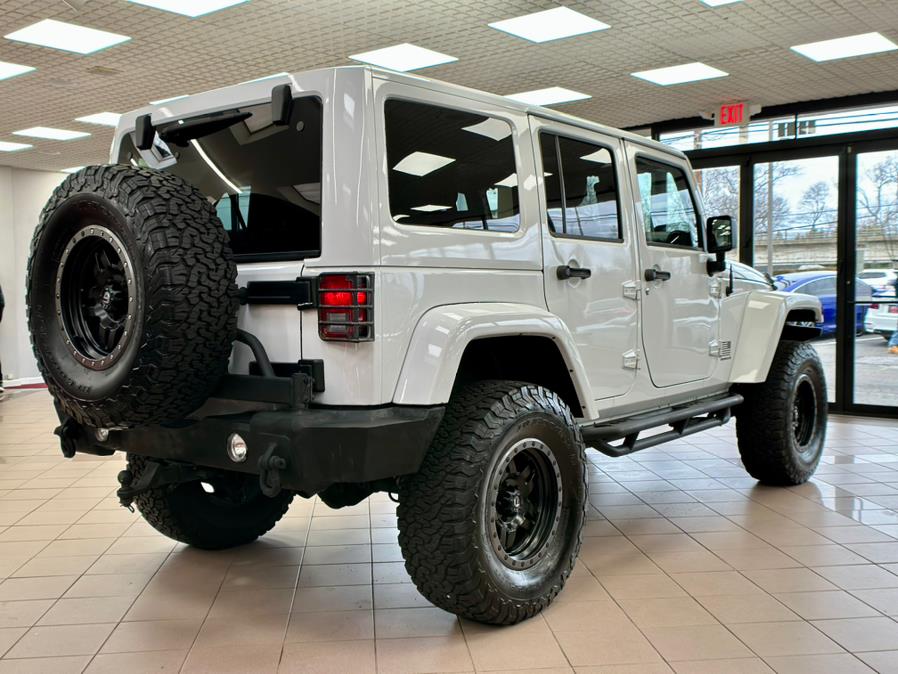 2015 Jeep Wrangler Unlimited 4WD 4dr Sahara, available for sale in Massapequa Park, New York | Power Motors East. Massapequa Park, New York 2015 Jeep Wrangler Unlimited 4WD 4dr Sahara, available for sale in Massapequa Park, New York | Power Motors East. Massapequa Park, New York