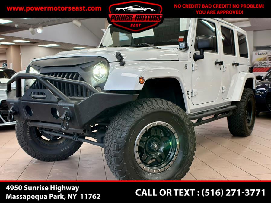2015 Jeep Wrangler Unlimited 4WD 4dr Sahara, available for sale in Massapequa Park, New York | Power Motors East. Massapequa Park, New York