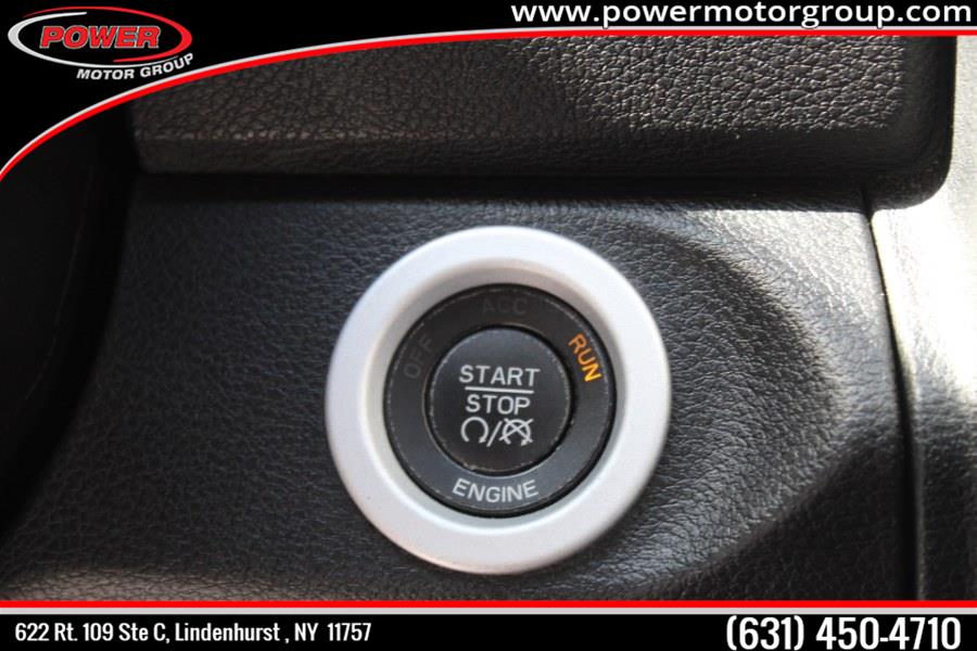 2013 Ram 1500 4WD Crew Cab 140.5" Sport, available for sale in Lindenhurst, New York | Power Motor Group. Lindenhurst, New York 2013 Ram 1500 4WD Crew Cab 140.5" Sport, available for sale in Lindenhurst, New York | Power Motor Group. Lindenhurst, New York