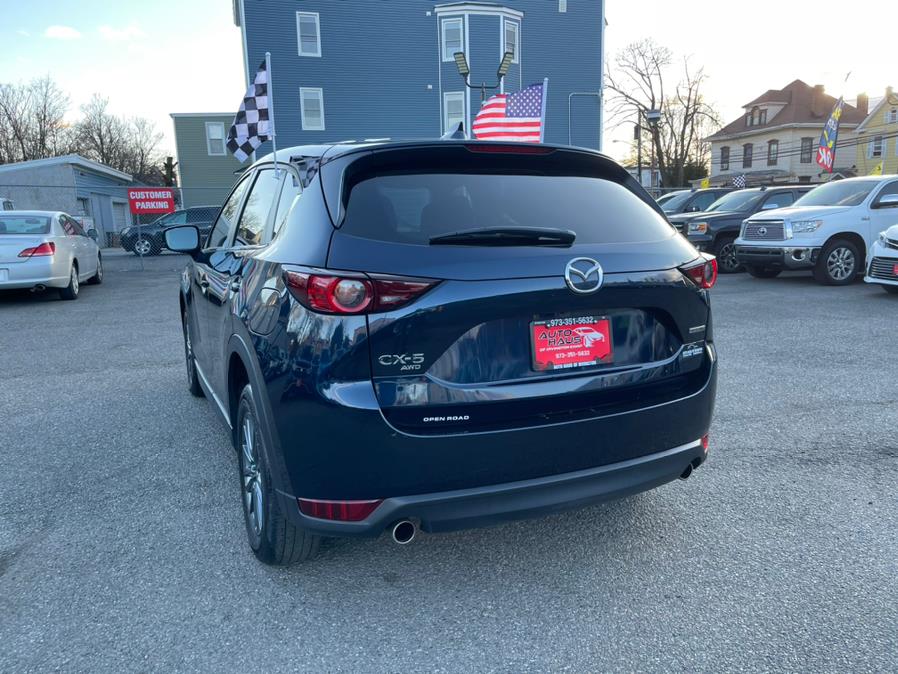 2021 Mazda CX-5 Touring AWD, available for sale in Irvington , New Jersey | Auto Haus of Irvington Corp. Irvington , New Jersey 2021 Mazda CX-5 Touring AWD, available for sale in Irvington , New Jersey | Auto Haus of Irvington Corp. Irvington , New Jersey