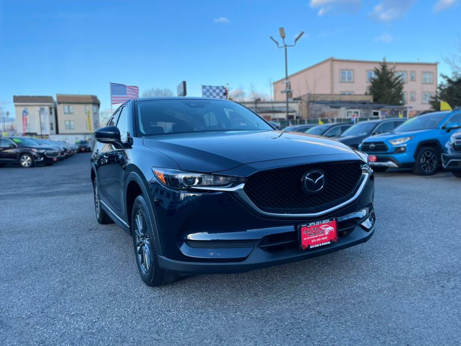2021 Mazda CX-5 Touring AWD, available for sale in Irvington , New Jersey | Auto Haus of Irvington Corp. Irvington , New Jersey 2021 Mazda CX-5 Touring AWD, available for sale in Irvington , New Jersey | Auto Haus of Irvington Corp. Irvington , New Jersey