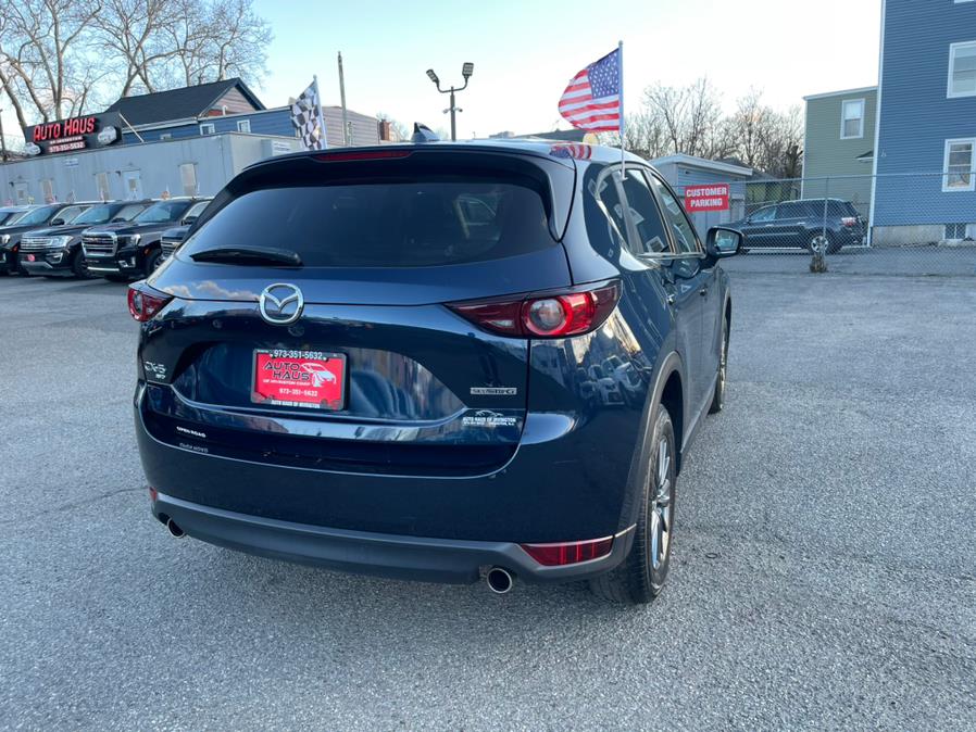 2021 Mazda CX-5 Touring AWD, available for sale in Irvington , New Jersey | Auto Haus of Irvington Corp. Irvington , New Jersey 2021 Mazda CX-5 Touring AWD, available for sale in Irvington , New Jersey | Auto Haus of Irvington Corp. Irvington , New Jersey