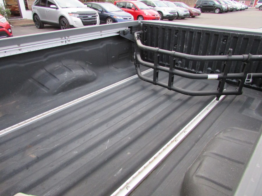 2014 Nissan Frontier 4WD King Cab Auto SV, available for sale in East Windsor, Connecticut | United Auto Sales of E Windsor, Inc. East Windsor, Connecticut 2014 Nissan Frontier 4WD King Cab Auto SV, available for sale in East Windsor, Connecticut | United Auto Sales of E Windsor, Inc. East Windsor, Connecticut
