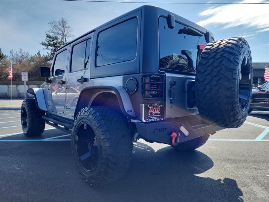 2016 Jeep Wrangler Unlimited 4WD 4dr Sport, available for sale in Islip, New York | L.I. Auto Gallery. Islip, New York 2016 Jeep Wrangler Unlimited 4WD 4dr Sport, available for sale in Islip, New York | L.I. Auto Gallery. Islip, New York