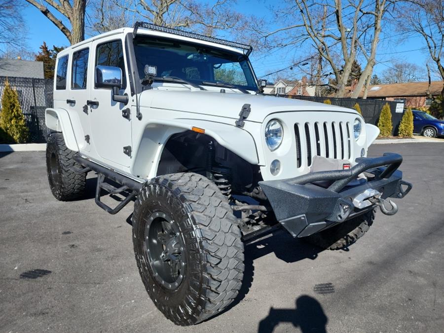 2016 Jeep Wrangler Unlimited 4WD 4dr Sahara, available for sale in Islip, New York | L.I. Auto Gallery. Islip, New York 2016 Jeep Wrangler Unlimited 4WD 4dr Sahara, available for sale in Islip, New York | L.I. Auto Gallery. Islip, New York