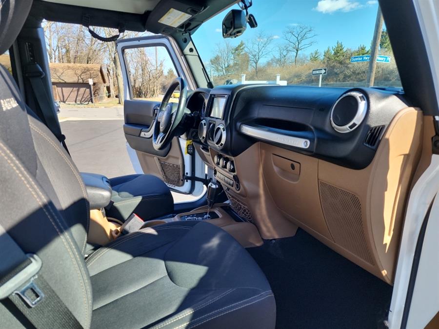2016 Jeep Wrangler Unlimited 4WD 4dr Sahara, available for sale in Islip, New York | L.I. Auto Gallery. Islip, New York 2016 Jeep Wrangler Unlimited 4WD 4dr Sahara, available for sale in Islip, New York | L.I. Auto Gallery. Islip, New York