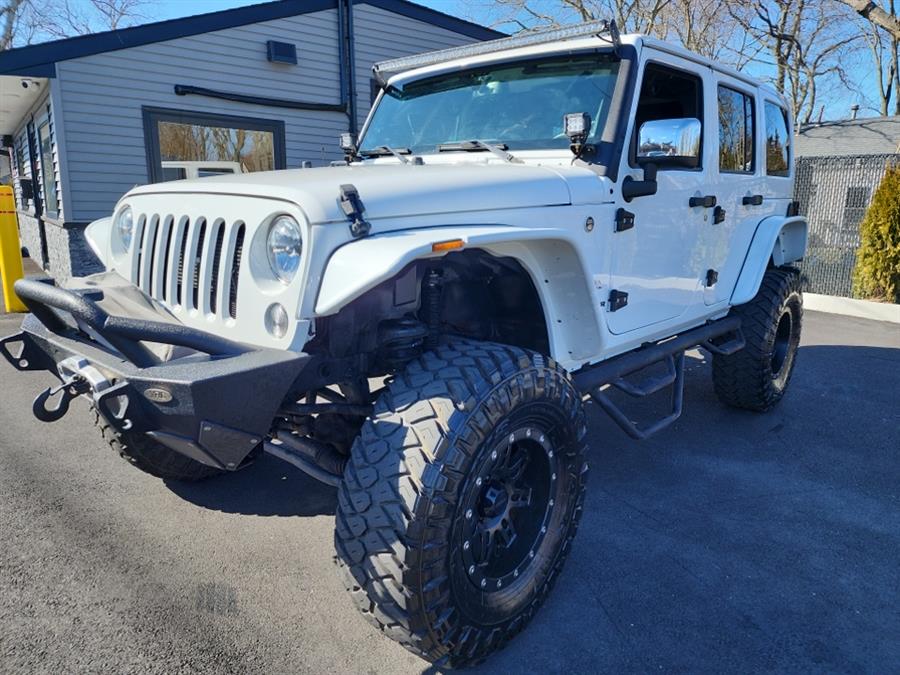 2016 Jeep Wrangler Unlimited 4WD 4dr Sahara, available for sale in Islip, New York | L.I. Auto Gallery. Islip, New York