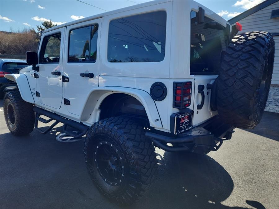 2016 Jeep Wrangler Unlimited 4WD 4dr Sahara, available for sale in Islip, New York | L.I. Auto Gallery. Islip, New York 2016 Jeep Wrangler Unlimited 4WD 4dr Sahara, available for sale in Islip, New York | L.I. Auto Gallery. Islip, New York