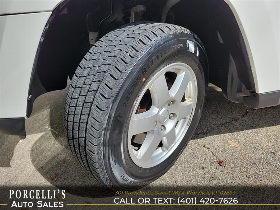 2010 Jeep Grand Cherokee 4WD 4dr Laredo, available for sale in West Warwick, Rhode Island | Porcelli's Auto Sales. West Warwick, Rhode Island 2010 Jeep Grand Cherokee 4WD 4dr Laredo, available for sale in West Warwick, Rhode Island | Porcelli's Auto Sales. West Warwick, Rhode Island