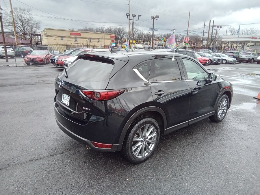 2021 Mazda CX-5 Grand Touring AWD, available for sale in Irvington, New Jersey | NJ Used Cars Center. Irvington, New Jersey 2021 Mazda CX-5 Grand Touring AWD, available for sale in Irvington, New Jersey | NJ Used Cars Center. Irvington, New Jersey