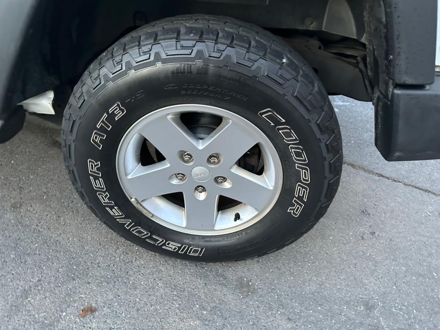 2011 Jeep Wrangler Unlimited 4WD 4dr Sport, available for sale in New Britain, Connecticut | Central Auto Sales & Service. New Britain, Connecticut 2011 Jeep Wrangler Unlimited 4WD 4dr Sport, available for sale in New Britain, Connecticut | Central Auto Sales & Service. New Britain, Connecticut