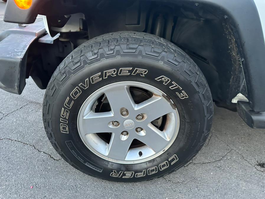 2011 Jeep Wrangler Unlimited 4WD 4dr Sport, available for sale in New Britain, Connecticut | Central Auto Sales & Service. New Britain, Connecticut 2011 Jeep Wrangler Unlimited 4WD 4dr Sport, available for sale in New Britain, Connecticut | Central Auto Sales & Service. New Britain, Connecticut