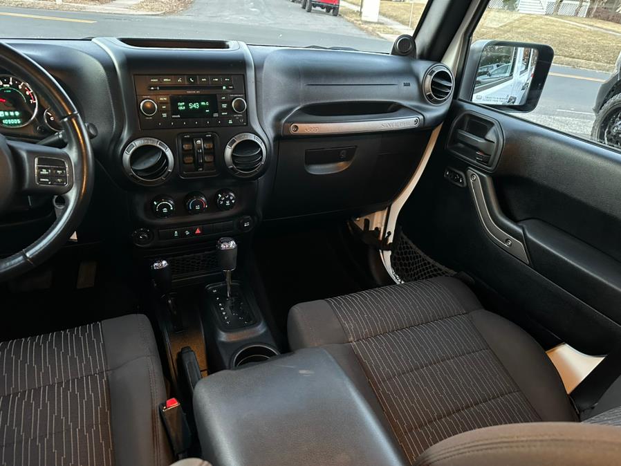 2011 Jeep Wrangler Unlimited 4WD 4dr Sport, available for sale in New Britain, Connecticut | Central Auto Sales & Service. New Britain, Connecticut 2011 Jeep Wrangler Unlimited 4WD 4dr Sport, available for sale in New Britain, Connecticut | Central Auto Sales & Service. New Britain, Connecticut