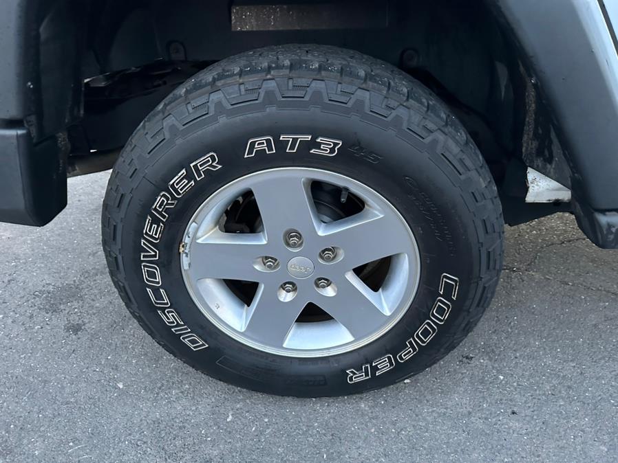 2011 Jeep Wrangler Unlimited 4WD 4dr Sport, available for sale in New Britain, Connecticut | Central Auto Sales & Service. New Britain, Connecticut 2011 Jeep Wrangler Unlimited 4WD 4dr Sport, available for sale in New Britain, Connecticut | Central Auto Sales & Service. New Britain, Connecticut