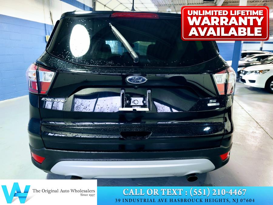 2018 Ford Escape SE 4WD, available for sale in Hasbrouck Heights, New Jersey | AW Auto & Truck Wholesalers, Inc. Hasbrouck Heights, New Jersey 2018 Ford Escape SE 4WD, available for sale in Hasbrouck Heights, New Jersey | AW Auto & Truck Wholesalers, Inc. Hasbrouck Heights, New Jersey