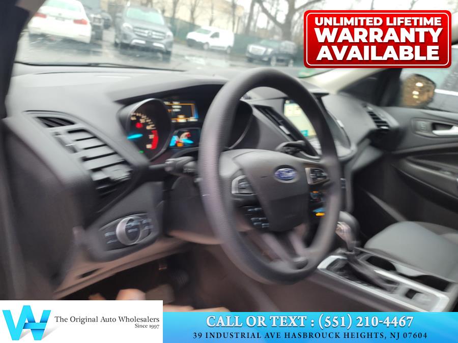 2018 Ford Escape SE 4WD, available for sale in Hasbrouck Heights, New Jersey | AW Auto & Truck Wholesalers, Inc. Hasbrouck Heights, New Jersey 2018 Ford Escape SE 4WD, available for sale in Hasbrouck Heights, New Jersey | AW Auto & Truck Wholesalers, Inc. Hasbrouck Heights, New Jersey