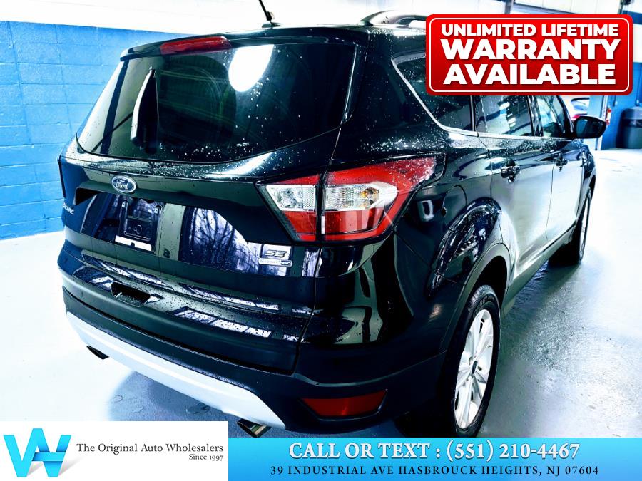 2018 Ford Escape SE 4WD, available for sale in Hasbrouck Heights, New Jersey | AW Auto & Truck Wholesalers, Inc. Hasbrouck Heights, New Jersey 2018 Ford Escape SE 4WD, available for sale in Hasbrouck Heights, New Jersey | AW Auto & Truck Wholesalers, Inc. Hasbrouck Heights, New Jersey