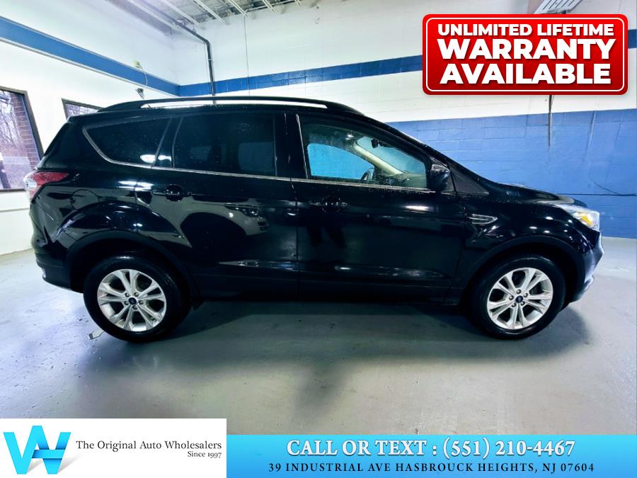 2018 Ford Escape SE 4WD, available for sale in Hasbrouck Heights, New Jersey | AW Auto & Truck Wholesalers, Inc. Hasbrouck Heights, New Jersey 2018 Ford Escape SE 4WD, available for sale in Hasbrouck Heights, New Jersey | AW Auto & Truck Wholesalers, Inc. Hasbrouck Heights, New Jersey