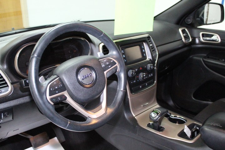 2014 Jeep Grand Cherokee 4WD 4dr Laredo, available for sale in Plainville, Connecticut | New England Auto Sales LLC. Plainville, Connecticut 2014 Jeep Grand Cherokee 4WD 4dr Laredo, available for sale in Plainville, Connecticut | New England Auto Sales LLC. Plainville, Connecticut