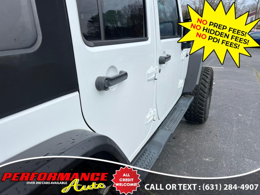2014 Jeep Wrangler Unlimited 4WD 4dr Sahara Altitude Edition, available for sale in Bohemia, New York | Performance Auto Inc. Bohemia, New York 2014 Jeep Wrangler Unlimited 4WD 4dr Sahara Altitude Edition, available for sale in Bohemia, New York | Performance Auto Inc. Bohemia, New York