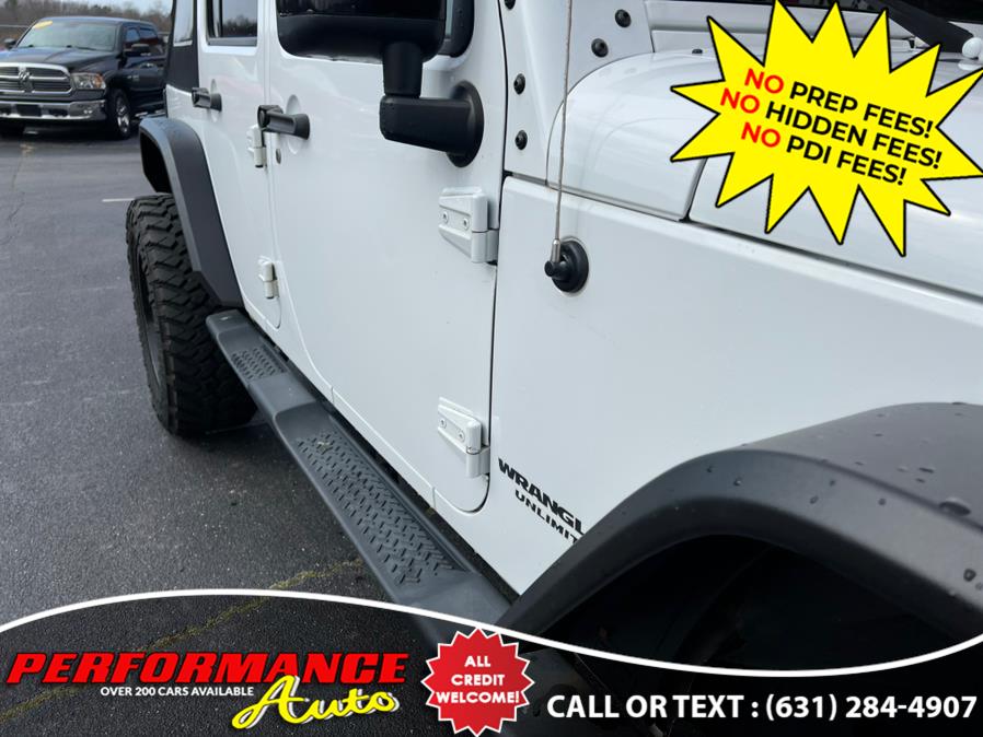 2014 Jeep Wrangler Unlimited 4WD 4dr Sahara Altitude Edition, available for sale in Bohemia, New York | Performance Auto Inc. Bohemia, New York 2014 Jeep Wrangler Unlimited 4WD 4dr Sahara Altitude Edition, available for sale in Bohemia, New York | Performance Auto Inc. Bohemia, New York
