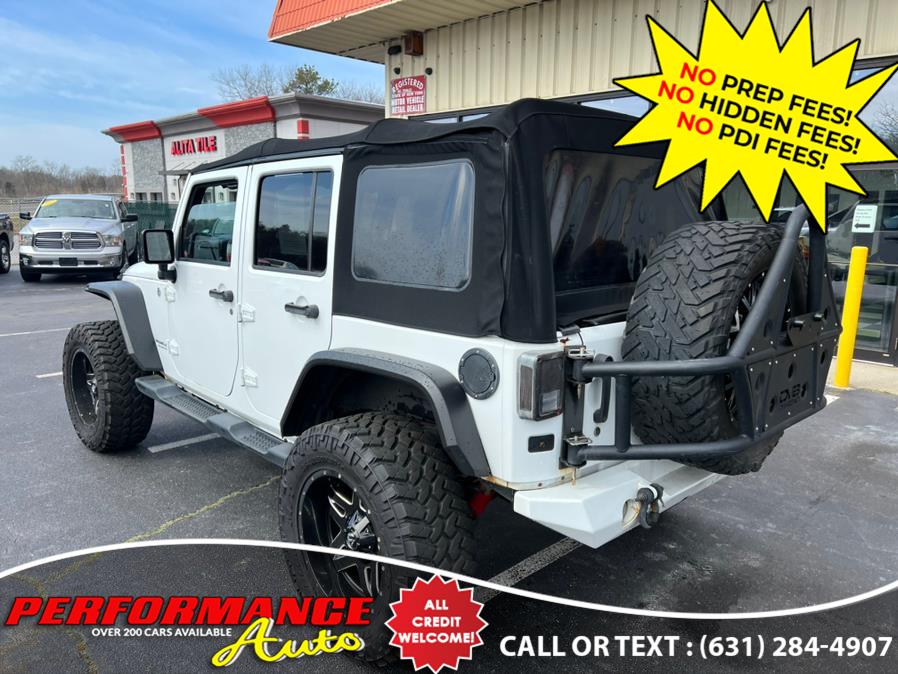 2014 Jeep Wrangler Unlimited 4WD 4dr Sahara Altitude Edition, available for sale in Bohemia, New York | Performance Auto Inc. Bohemia, New York 2014 Jeep Wrangler Unlimited 4WD 4dr Sahara Altitude Edition, available for sale in Bohemia, New York | Performance Auto Inc. Bohemia, New York