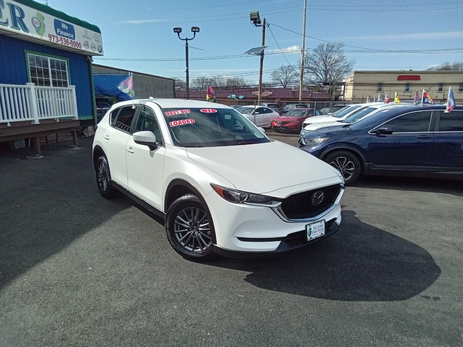 2021 Mazda CX-5 Carbon Edition FWD, available for sale in Irvington, New Jersey | NJ Used Cars Center. Irvington, New Jersey 2021 Mazda CX-5 Carbon Edition FWD, available for sale in Irvington, New Jersey | NJ Used Cars Center. Irvington, New Jersey