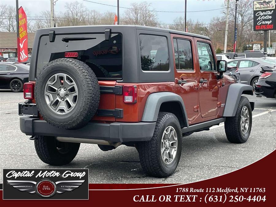 2014 Jeep Wrangler Unlimited 4WD 4dr Rubicon, available for sale in Medford, New York | Capital Motor Group Inc. Medford, New York 2014 Jeep Wrangler Unlimited 4WD 4dr Rubicon, available for sale in Medford, New York | Capital Motor Group Inc. Medford, New York