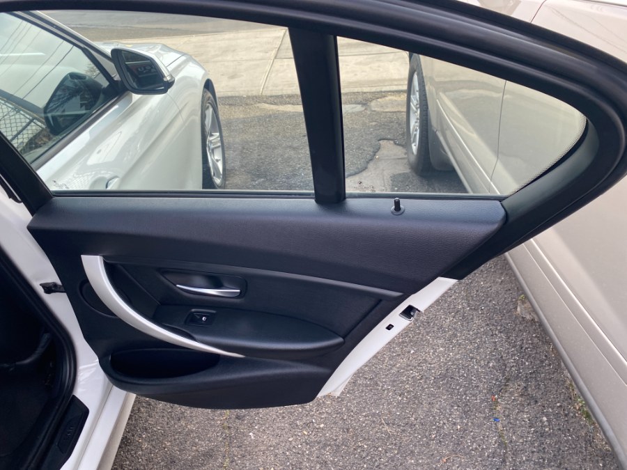 2013 BMW 3 Series 4dr Sdn 320i xDrive AWD, available for sale in Middle Village, New York | Middle Village Motors . Middle Village, New York 2013 BMW 3 Series 4dr Sdn 320i xDrive AWD, available for sale in Middle Village, New York | Middle Village Motors . Middle Village, New York