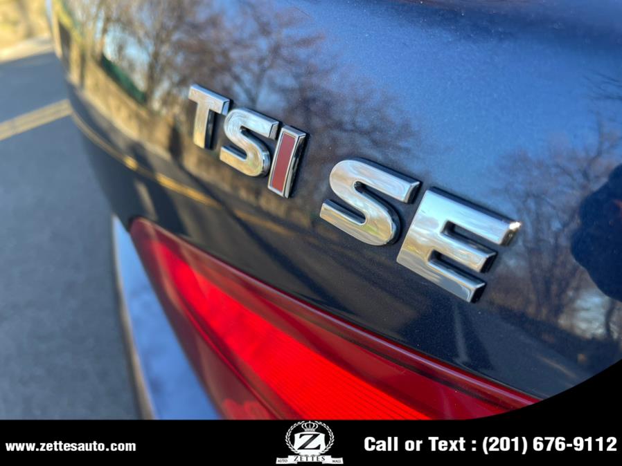 2015 Volkswagen Passat 4dr Sdn 1.8T Auto SE w/Sunroof & Nav PZEV, available for sale in Jersey City, New Jersey | Zettes Auto Mall. Jersey City, New Jersey 2015 Volkswagen Passat 4dr Sdn 1.8T Auto SE w/Sunroof & Nav PZEV, available for sale in Jersey City, New Jersey | Zettes Auto Mall. Jersey City, New Jersey
