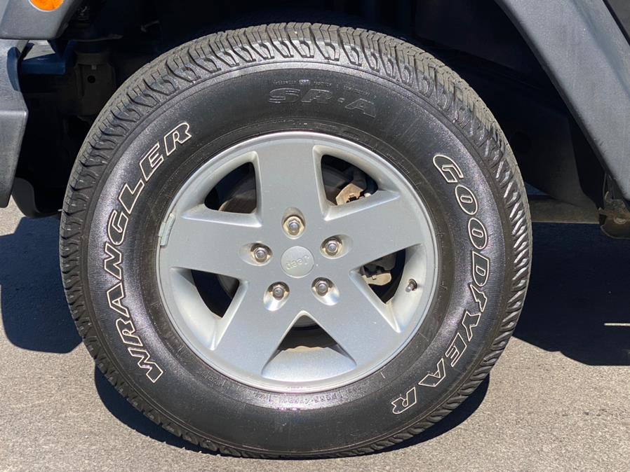 2012 Jeep Wrangler Unlimited 4WD 4dr Sport, available for sale in Canton, Connecticut | Lava Motors 2 Inc. Canton, Connecticut 2012 Jeep Wrangler Unlimited 4WD 4dr Sport, available for sale in Canton, Connecticut | Lava Motors 2 Inc. Canton, Connecticut