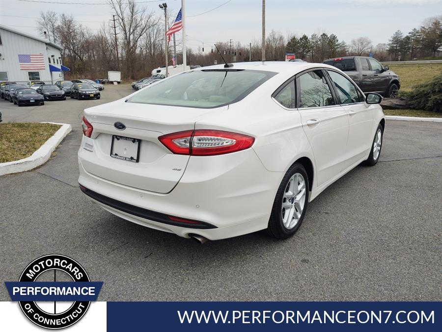 2016 Ford Fusion 4dr Sdn SE FWD, available for sale in Wilton, Connecticut | Performance Motor Cars Of Connecticut LLC. Wilton, Connecticut 2016 Ford Fusion 4dr Sdn SE FWD, available for sale in Wilton, Connecticut | Performance Motor Cars Of Connecticut LLC. Wilton, Connecticut