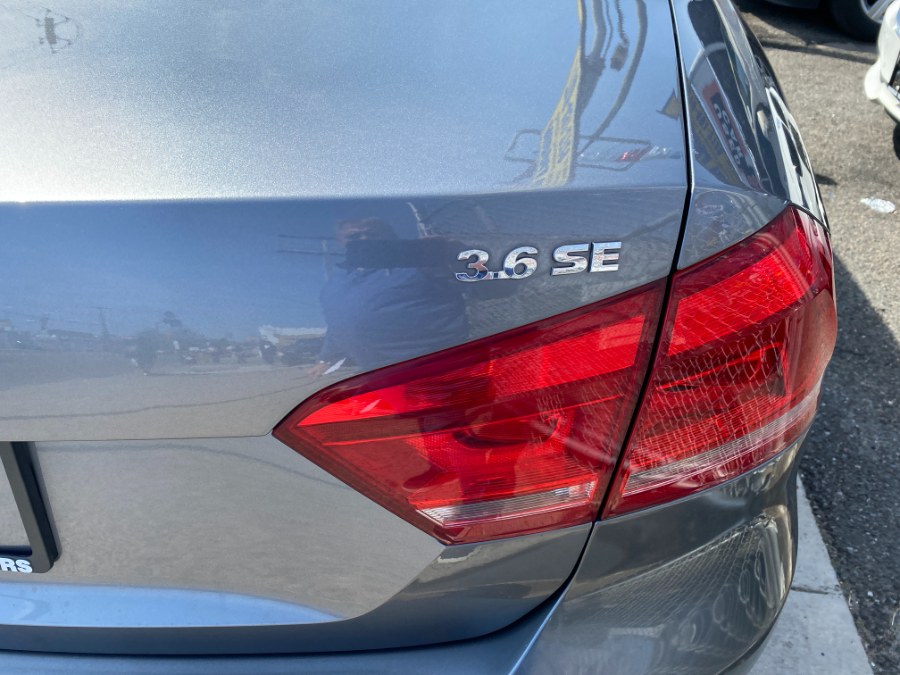 2012 Volkswagen Passat 4dr Sdn 3.6L V6 DSG SE w/Sunroof, available for sale in Middle Village, New York | Middle Village Motors . Middle Village, New York 2012 Volkswagen Passat 4dr Sdn 3.6L V6 DSG SE w/Sunroof, available for sale in Middle Village, New York | Middle Village Motors . Middle Village, New York