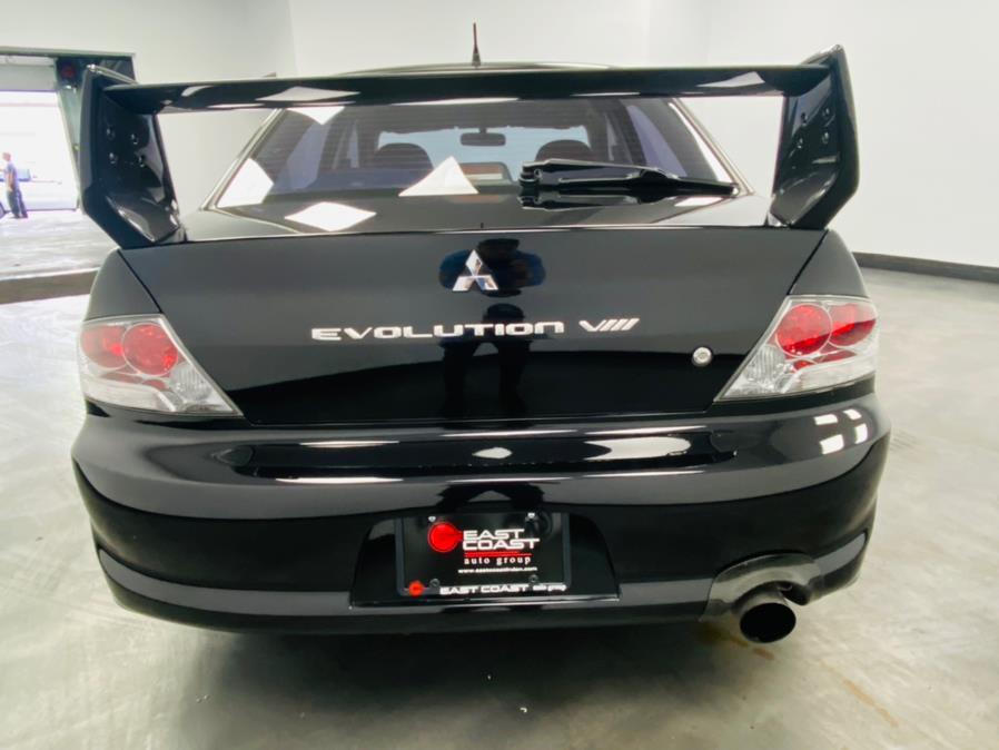 2003 Mitsubishi Lancer 4dr Sdn Evolution Manual, available for sale in Linden, New Jersey | East Coast Auto Group. Linden, New Jersey 2003 Mitsubishi Lancer 4dr Sdn Evolution Manual, available for sale in Linden, New Jersey | East Coast Auto Group. Linden, New Jersey