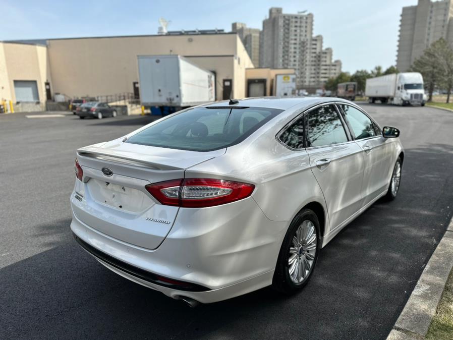 2014 Ford Fusion Energi 4dr Sdn Titanium, available for sale in Revere, Massachusetts | Wonderland Auto. Revere, Massachusetts 2014 Ford Fusion Energi 4dr Sdn Titanium, available for sale in Revere, Massachusetts | Wonderland Auto. Revere, Massachusetts