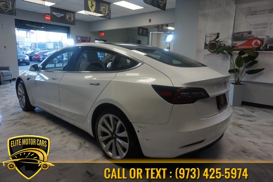 2020 Tesla Model 3 Standard Range Plus RWD, available for sale in Newark, New Jersey | Elite Motor Cars. Newark, New Jersey 2020 Tesla Model 3 Standard Range Plus RWD, available for sale in Newark, New Jersey | Elite Motor Cars. Newark, New Jersey