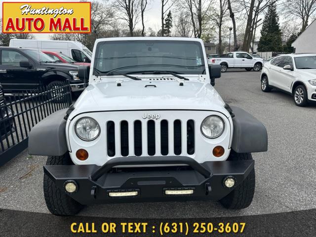 2012 Jeep Wrangler Unlimited 4WD 4dr Sport, available for sale in Huntington Station, New York | Huntington Auto Mall. Huntington Station, New York 2012 Jeep Wrangler Unlimited 4WD 4dr Sport, available for sale in Huntington Station, New York | Huntington Auto Mall. Huntington Station, New York
