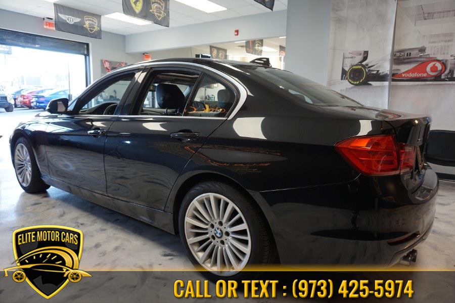 2014 BMW 3 Series 4dr Sdn 328i xDrive AWD SULEV, available for sale in Newark, New Jersey | Elite Motor Cars. Newark, New Jersey 2014 BMW 3 Series 4dr Sdn 328i xDrive AWD SULEV, available for sale in Newark, New Jersey | Elite Motor Cars. Newark, New Jersey