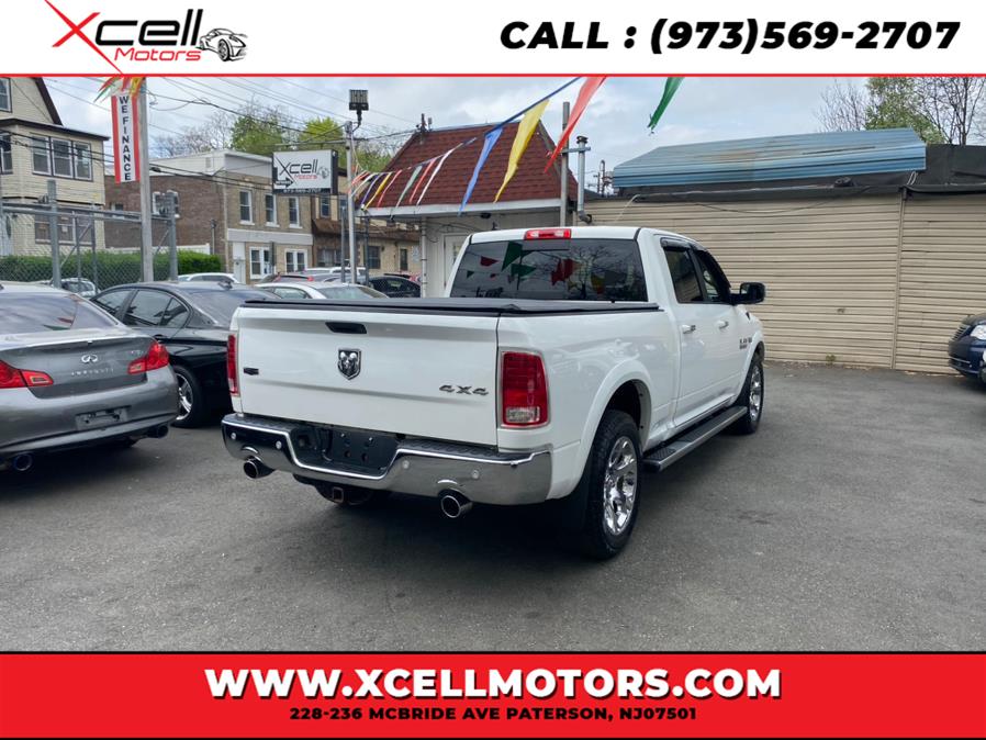 2014 Ram 1500 4WD Crew Cab Laramie 4WD Crew Cab 149" Laramie, available for sale in Paterson, New Jersey | Xcell Motors LLC. Paterson, New Jersey 2014 Ram 1500 4WD Crew Cab Laramie 4WD Crew Cab 149" Laramie, available for sale in Paterson, New Jersey | Xcell Motors LLC. Paterson, New Jersey