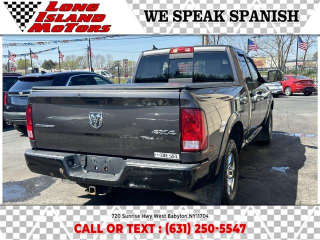 2015 Ram 1500 4WD Quad Cab 140.5" Big Horn, available for sale in West Babylon, New York | Long Island Motors. West Babylon, New York 2015 Ram 1500 4WD Quad Cab 140.5" Big Horn, available for sale in West Babylon, New York | Long Island Motors. West Babylon, New York