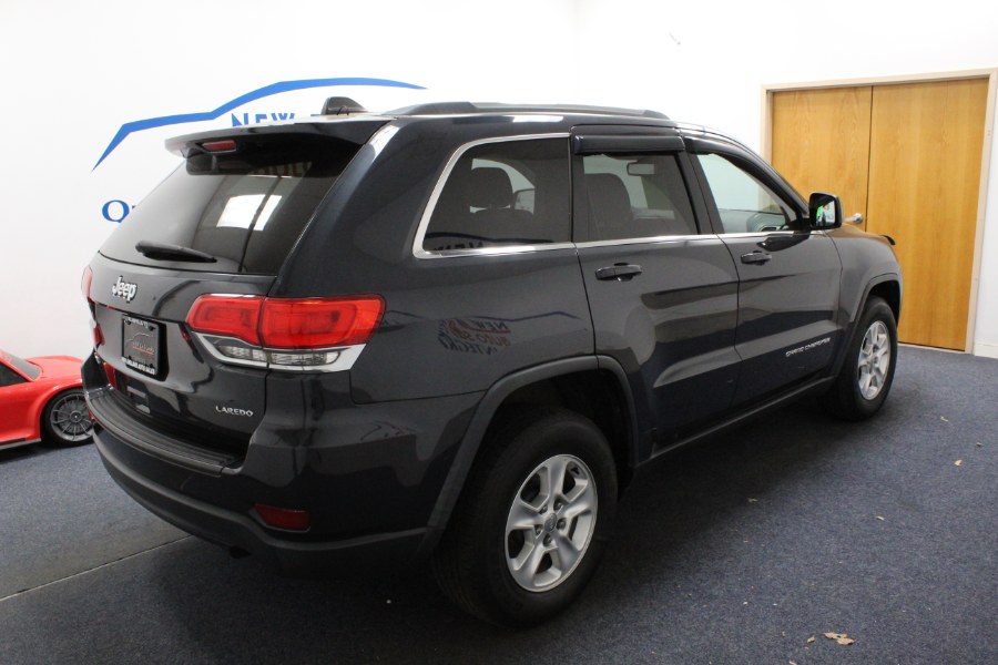 2014 Jeep Grand Cherokee 4WD 4dr Laredo, available for sale in Plainville, Connecticut | New England Auto Sales LLC. Plainville, Connecticut 2014 Jeep Grand Cherokee 4WD 4dr Laredo, available for sale in Plainville, Connecticut | New England Auto Sales LLC. Plainville, Connecticut