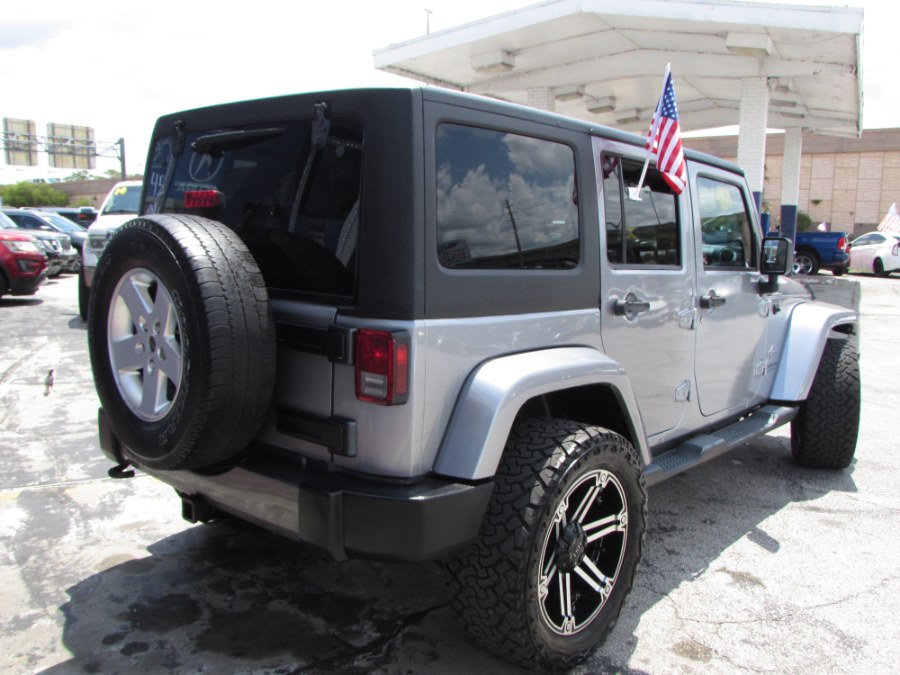 2014 Jeep Wrangler Unlimited 4WD 4dr Willys Wheeler, available for sale in Orlando, Florida | VIP Auto Enterprise, Inc. Orlando, Florida 2014 Jeep Wrangler Unlimited 4WD 4dr Willys Wheeler, available for sale in Orlando, Florida | VIP Auto Enterprise, Inc. Orlando, Florida