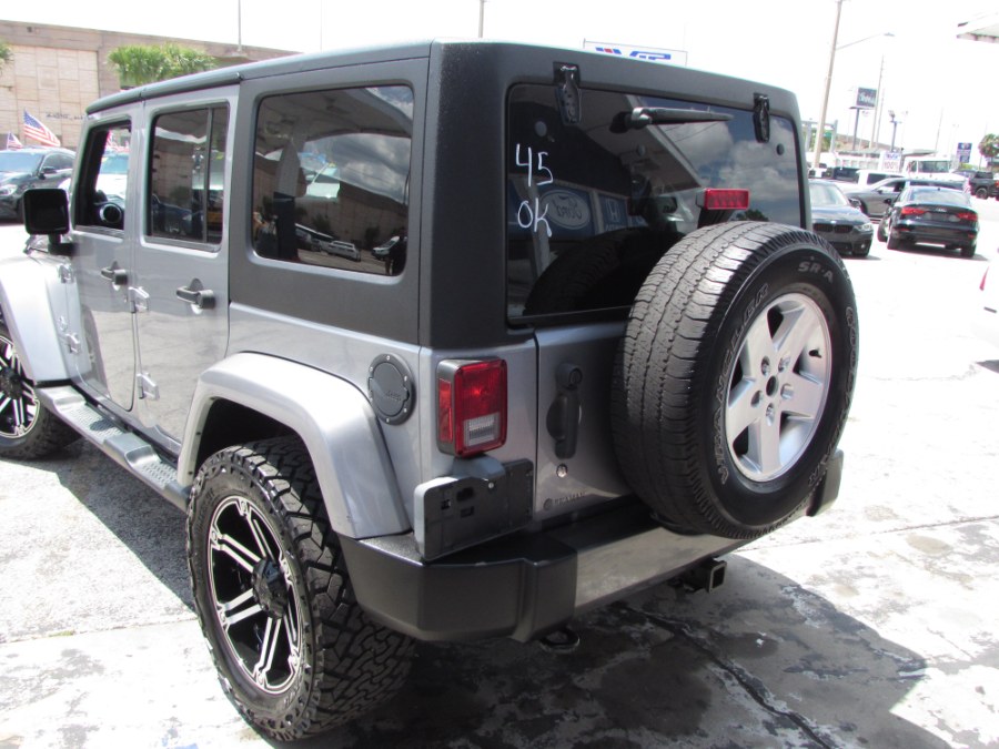 2014 Jeep Wrangler Unlimited 4WD 4dr Willys Wheeler, available for sale in Orlando, Florida | VIP Auto Enterprise, Inc. Orlando, Florida 2014 Jeep Wrangler Unlimited 4WD 4dr Willys Wheeler, available for sale in Orlando, Florida | VIP Auto Enterprise, Inc. Orlando, Florida