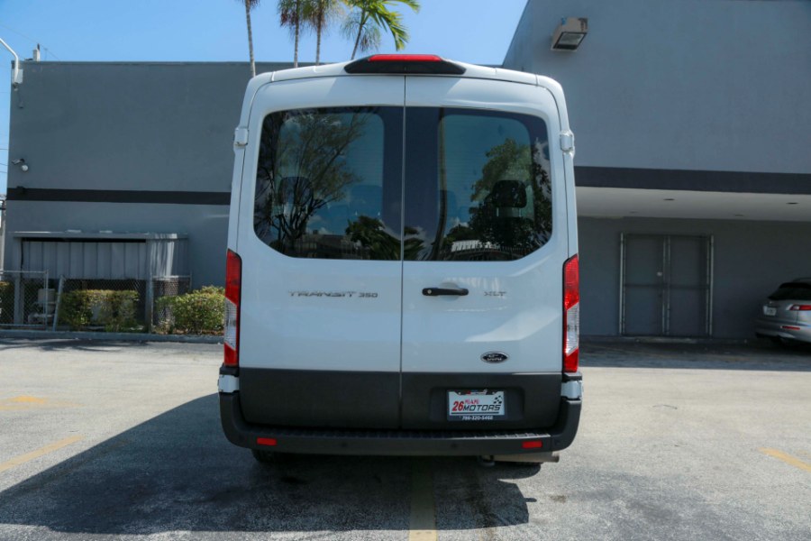 2021 Ford Transit Passenger Wagon T-350 148" Med Roof XLT RWD, available for sale in Miami, Florida | 26 Motors Miami. Miami, Florida 2021 Ford Transit Passenger Wagon T-350 148" Med Roof XLT RWD, available for sale in Miami, Florida | 26 Motors Miami. Miami, Florida
