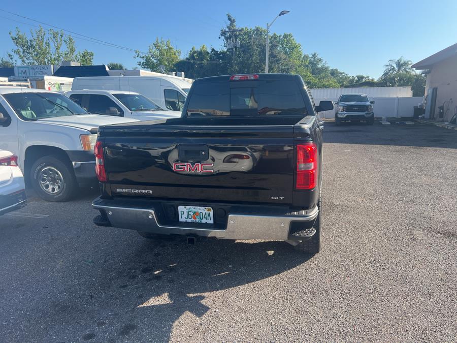 2015 GMC Sierra 1500 4WD Crew Cab 143.5" SLT, available for sale in Kissimmee, Florida | Central florida Auto Trader. Kissimmee, Florida 2015 GMC Sierra 1500 4WD Crew Cab 143.5" SLT, available for sale in Kissimmee, Florida | Central florida Auto Trader. Kissimmee, Florida