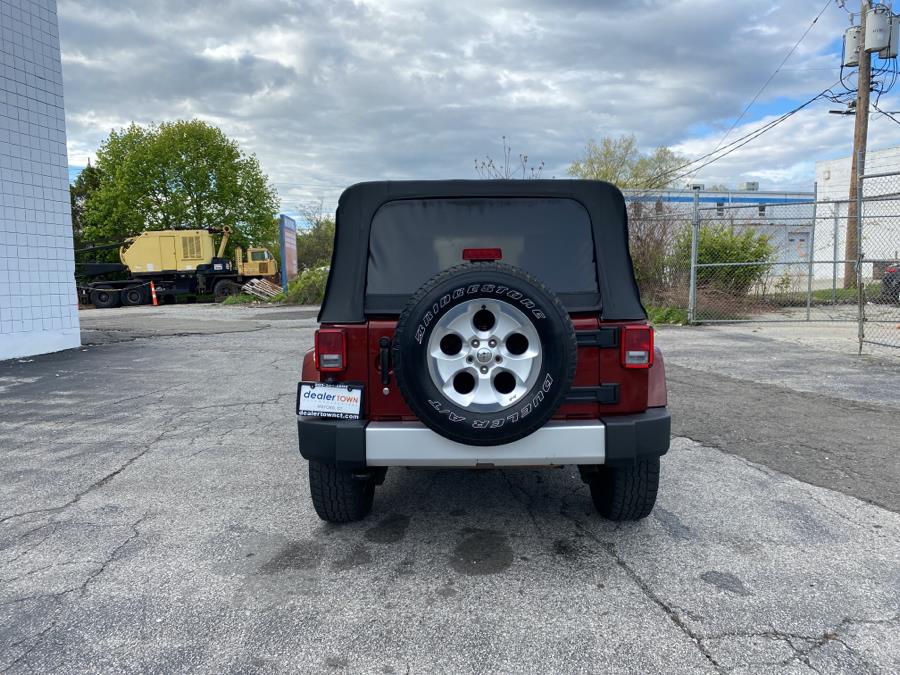2010 Jeep Wrangler Unlimited 4WD 4dr Sahara, available for sale in Milford, Connecticut | Dealertown Auto Wholesalers. Milford, Connecticut 2010 Jeep Wrangler Unlimited 4WD 4dr Sahara, available for sale in Milford, Connecticut | Dealertown Auto Wholesalers. Milford, Connecticut