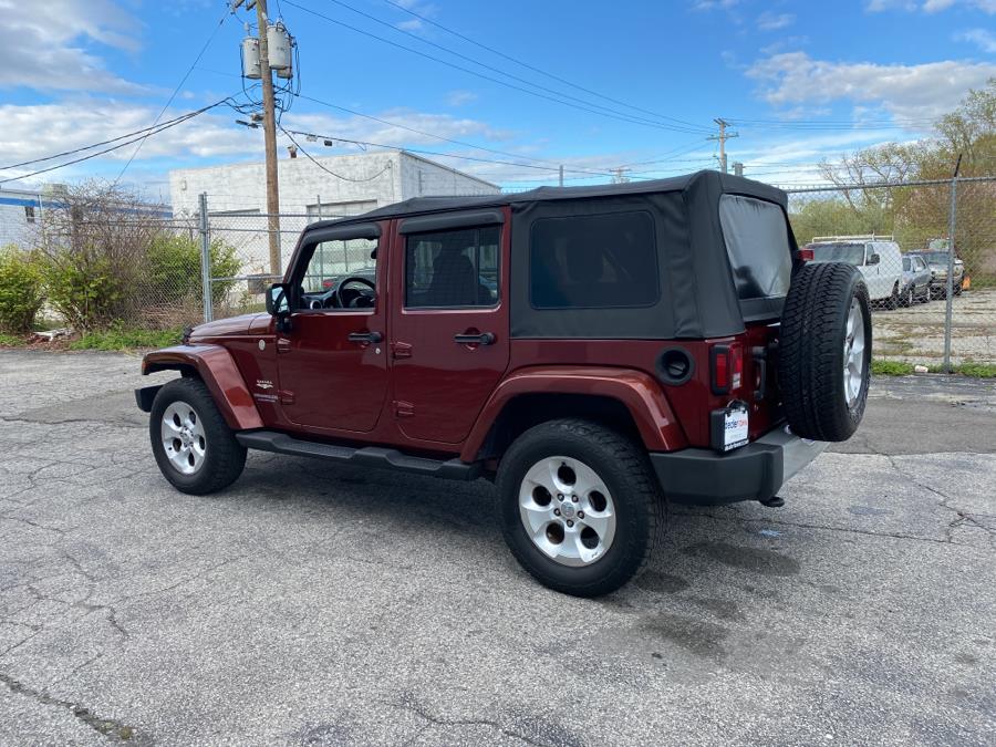 2010 Jeep Wrangler Unlimited 4WD 4dr Sahara, available for sale in Milford, Connecticut | Dealertown Auto Wholesalers. Milford, Connecticut 2010 Jeep Wrangler Unlimited 4WD 4dr Sahara, available for sale in Milford, Connecticut | Dealertown Auto Wholesalers. Milford, Connecticut