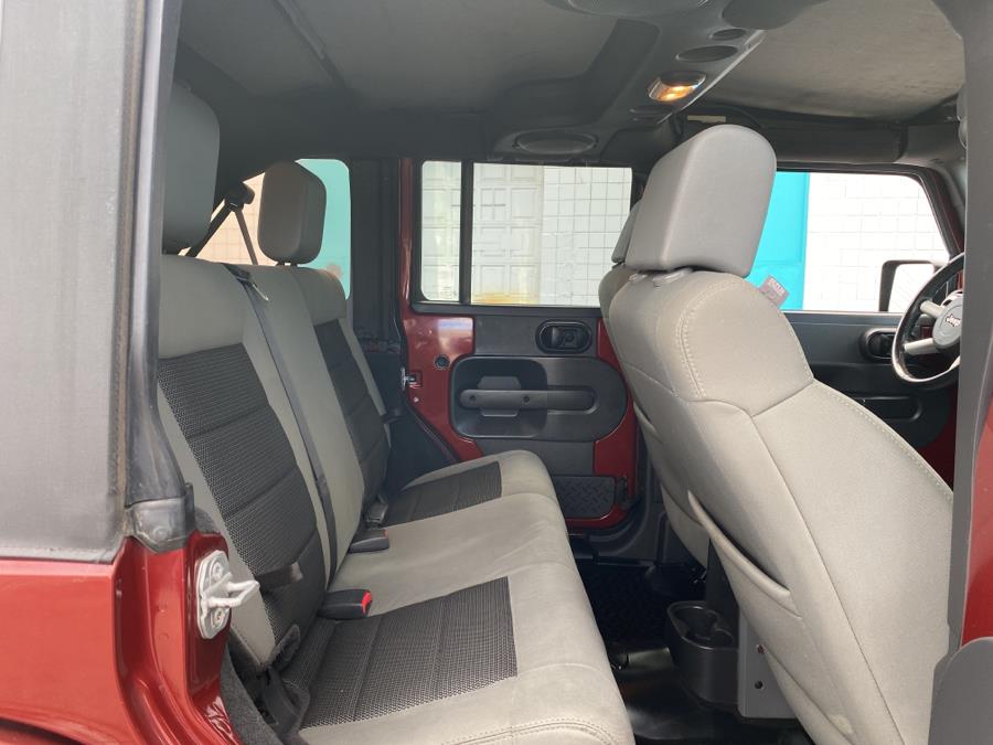 2010 Jeep Wrangler Unlimited 4WD 4dr Sahara, available for sale in Milford, Connecticut | Dealertown Auto Wholesalers. Milford, Connecticut 2010 Jeep Wrangler Unlimited 4WD 4dr Sahara, available for sale in Milford, Connecticut | Dealertown Auto Wholesalers. Milford, Connecticut