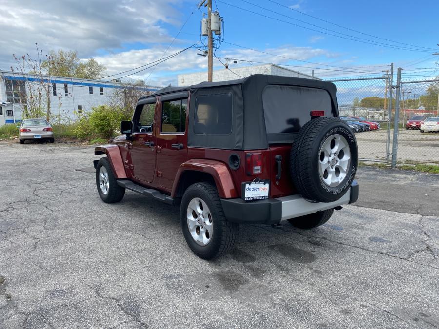 2010 Jeep Wrangler Unlimited 4WD 4dr Sahara, available for sale in Milford, Connecticut | Dealertown Auto Wholesalers. Milford, Connecticut 2010 Jeep Wrangler Unlimited 4WD 4dr Sahara, available for sale in Milford, Connecticut | Dealertown Auto Wholesalers. Milford, Connecticut