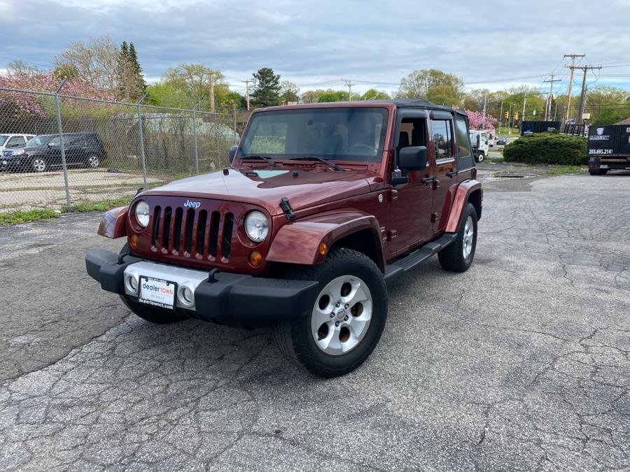 2010 Jeep Wrangler Unlimited 4WD 4dr Sahara, available for sale in Milford, Connecticut | Dealertown Auto Wholesalers. Milford, Connecticut 2010 Jeep Wrangler Unlimited 4WD 4dr Sahara, available for sale in Milford, Connecticut | Dealertown Auto Wholesalers. Milford, Connecticut